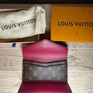 Louis Vuitton monogram wallet.